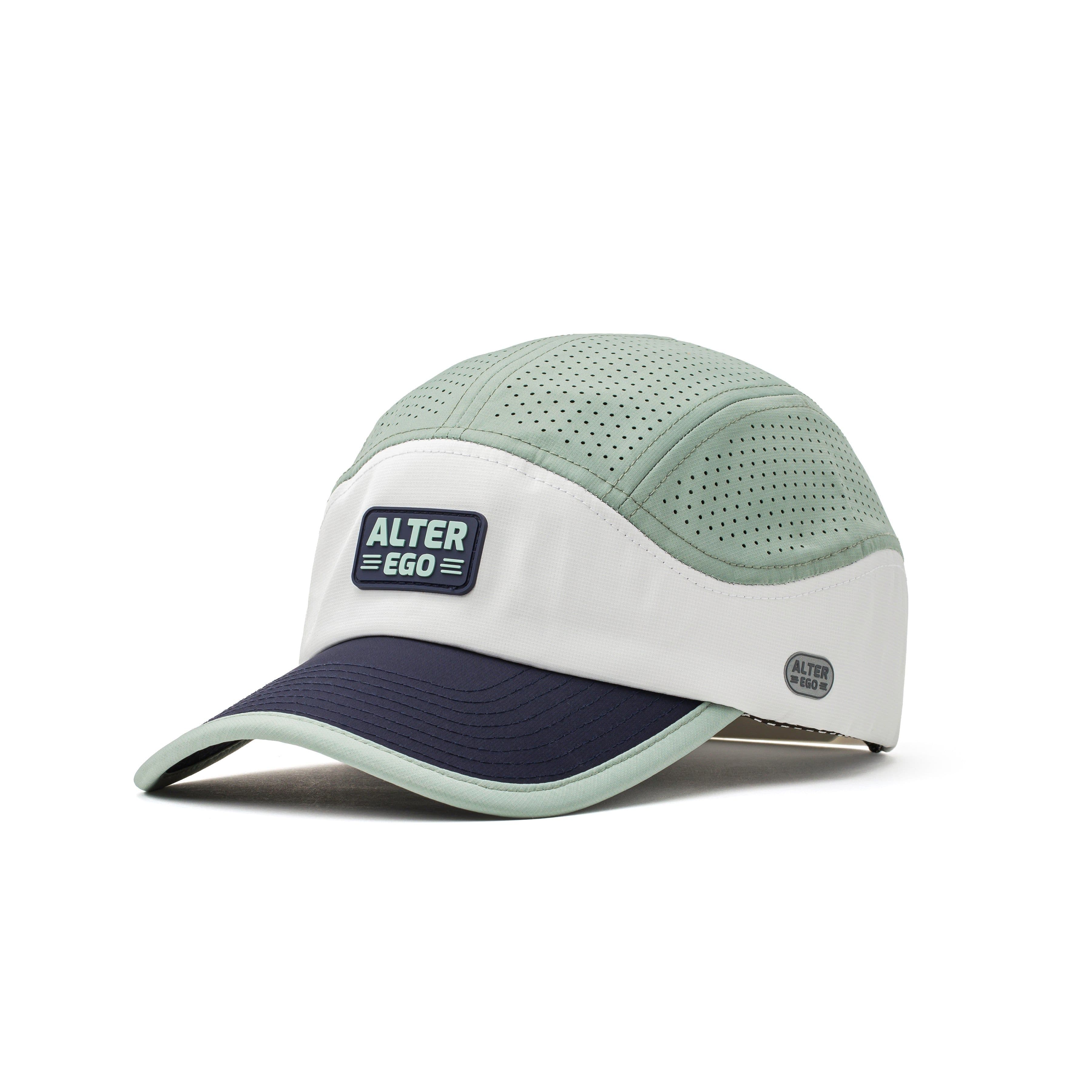 Alter Ego Running Cruiser Pro Splash Evening Fog hat, front three-quarter view, showing the white front with Alter Ego rubber patch, sage perforated side panels, and navy flat brim